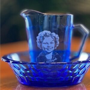 Vibrant Blue Glass Art Pitcher with Portrait